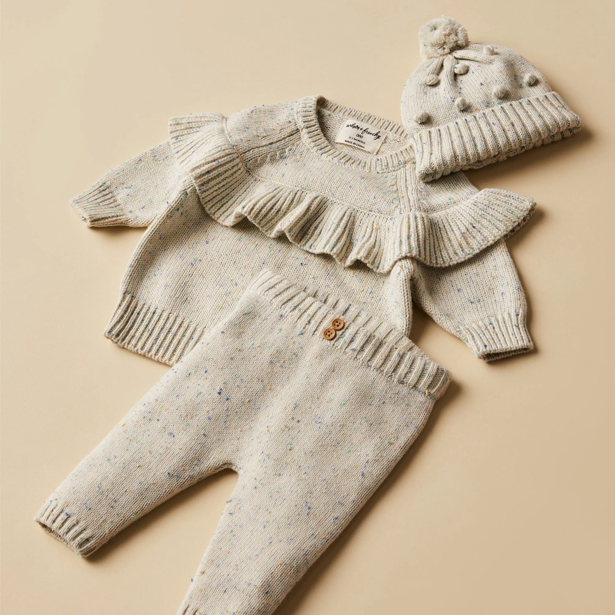 Dew Fleck Knitted Ruffle Jumper